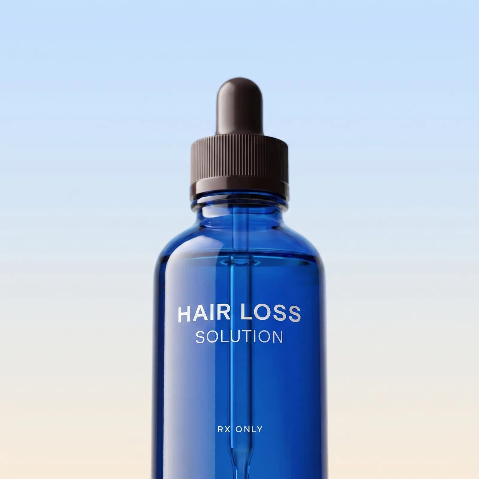 Blue dropper bottle labeled Hair Loss Solution, Rx only