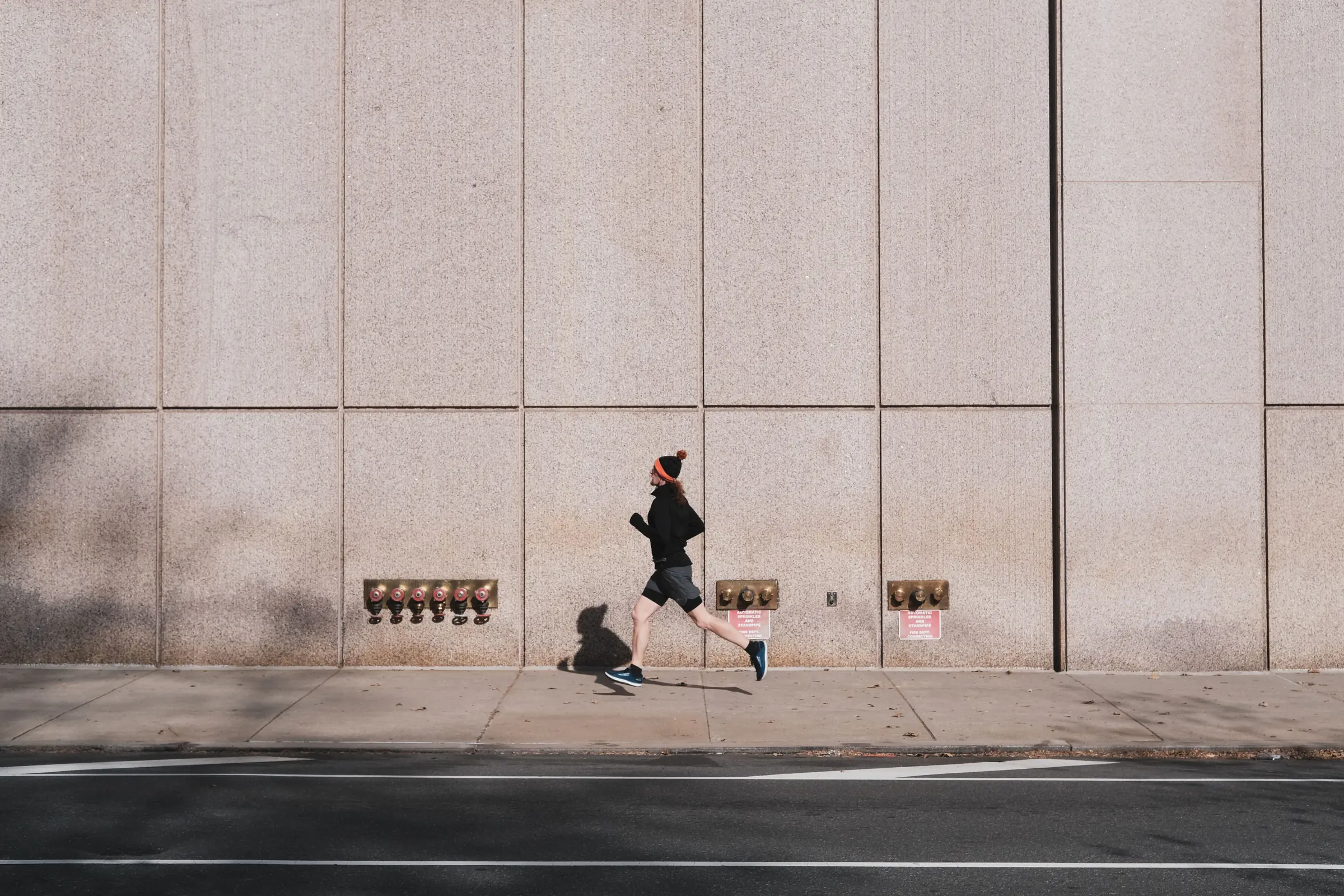Runner mid-stride at sunrise